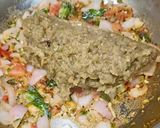 A picture of step 5 of Maharashtrian Lunch Thali of Bhakri, Vangyache Bharit, Phodniche Varan, Gul aani Tup.