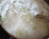 A picture of step 4 of Suji coconut balls.