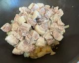 A picture of step 2 of Pork Belly Sinigang.