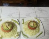 Foto del paso 5 de la receta: Tomate 🍅 relleno con pollo🍗 y palta con una cama de arroz