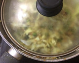 A picture of step 2 of Cabbage with green peas.