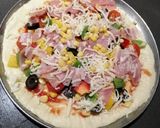 A picture of step 4 of Olive Pizza.
