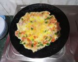 A picture of step 1 of Roti Omelete.