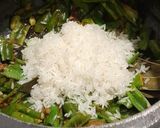 A picture of step 4 of Flat Beans Rice.