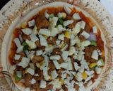 A picture of step 3 of Chicken tikka pizza.