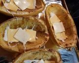 A picture of step 5 of Spaghetti Squash Breakfast Boats.