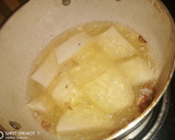 A picture of step 1 of Fried yam with source.