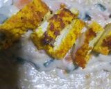 A picture of step 5 of Tortilla wrap filled grilled cheesy white sauce.