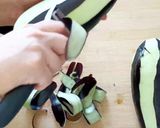 A picture of step 1 of Eggplant with Olives.