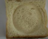 A picture of step 2 of Cheesy Baked Egg Toast.