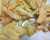 A picture of step 6 of Garlic honey chilli potato.