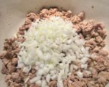 A picture of step 1 of Malloreddus alla Campidanese (pasta with saffron, tomato and pork sausage ragù).