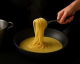 Foto del passaggio 5 della ricetta Spaghetti in crema di cocco con arachidi e curry