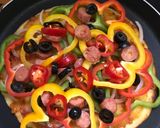 A picture of step 5 of Instant Rava pizza.