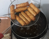 A picture of step 8 of Cheat Day Crispy pork spring rolls.
