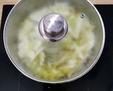 Une image de l'étape 2 de Papillote de saumon et légumes de saison.