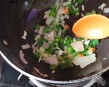 A picture of step 8 of Triple Schezwan fried rice.