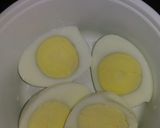 A picture of step 1 of Egg matar masala.