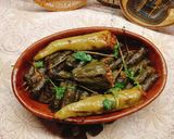 A picture of step 5 of Stuffed Grape Leaves with Country-Style Rooster.