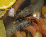 Foto del paso 4 de la receta: Arroz meloso marinero con marisco y pescado