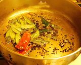 A picture of step 6 of Spicy aromatic nutritious stuffed bitter gourd in tomato sauce.