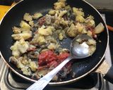 A picture of step 3 of Brinjal Pav Bhaji.