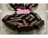 صورة لخطوة 1 من وصفة أصابع شوكلاتة محشية بالجوز الهند🍫