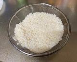 A picture of step 1 of Fruits Coconut Milk with Sweet Sticky Rice.