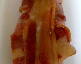 A picture of step 6 of Bacon Wrapped around Chicken breast with soft Smoked Cheese 🤩.