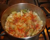 Foto del paso 6 de la receta Sepia con patatas y alcachofas