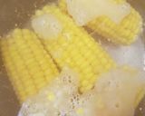 A picture of step 1 of Garlic, Corn, Tomato. Mozzarella topping & Grated Cheese. Salsa.