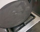 A picture of step 1 of Tawa bread pizza.