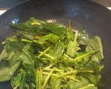 A picture of step 4 of Spinach stir fry.