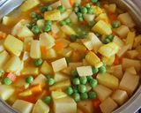Foto del paso 6 de la receta: CauCau de pota con palillo
