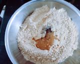 A picture of step 3 of Protein rich healthy roasted chana dal chopped dry fruit and sesame seeds ladoo.