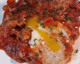 A picture of step 5 of Chorizo and Eggs in a Cheesey Tomato Sauce.