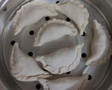 কাঁচা নারকেল এর ভাপা পুলি ( kancha narkel bhapa puli recipe in Bengali রেসিপির ধাপ 7 ছবি