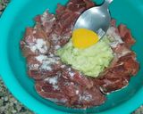 A picture of step 1 of Tala hua gosht Hyderabadi.