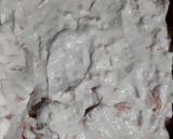 A picture of step 5 of Coloured vermicelli strawberry custard ice cream.