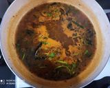 A picture of step 8 of Idiyaapam with rasam.
