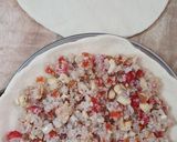 A picture of step 10 of Dilkush or sweet bread with coconut and tutti frutti filling.