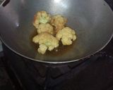 A picture of step 13 of Aloo fulcopi katla rosha ar misti doi.
