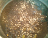 Foto del paso 12 de la receta: Risotto nero con vongole e telline con parmigiano e mela aioli