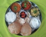 A picture of step 18 of South Indian Thali.