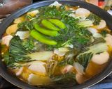 A picture of step 4 of Pork Belly Sinigang.