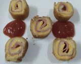 Foto del paso 9 de la receta: Rollitos de pan, jamón y queso