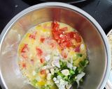 A picture of step 3 of Italian cheese and herbs omelette.