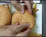 A picture of step 7 of Crisp fry chicken burgers 👌😋.