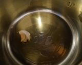 Foto del passaggio 3 della ricetta Totani in umido con fagioli occhio nero