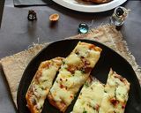 A picture of step 6 of Chessey garlic naan sticks.